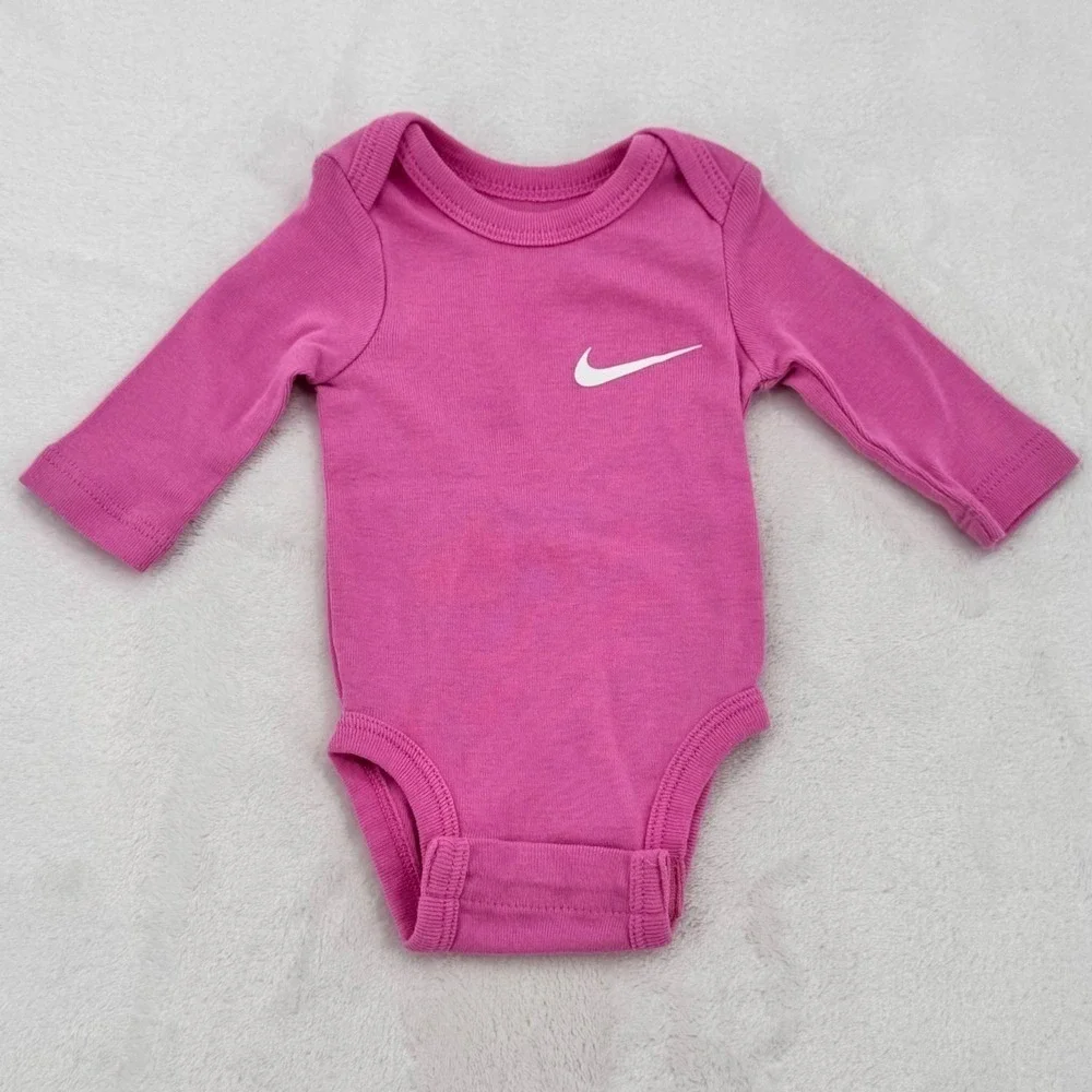 Nike Girls Pink Long Sleeve Bodysuit Onesie Baby Size Newborn Cotton Blend NWOT